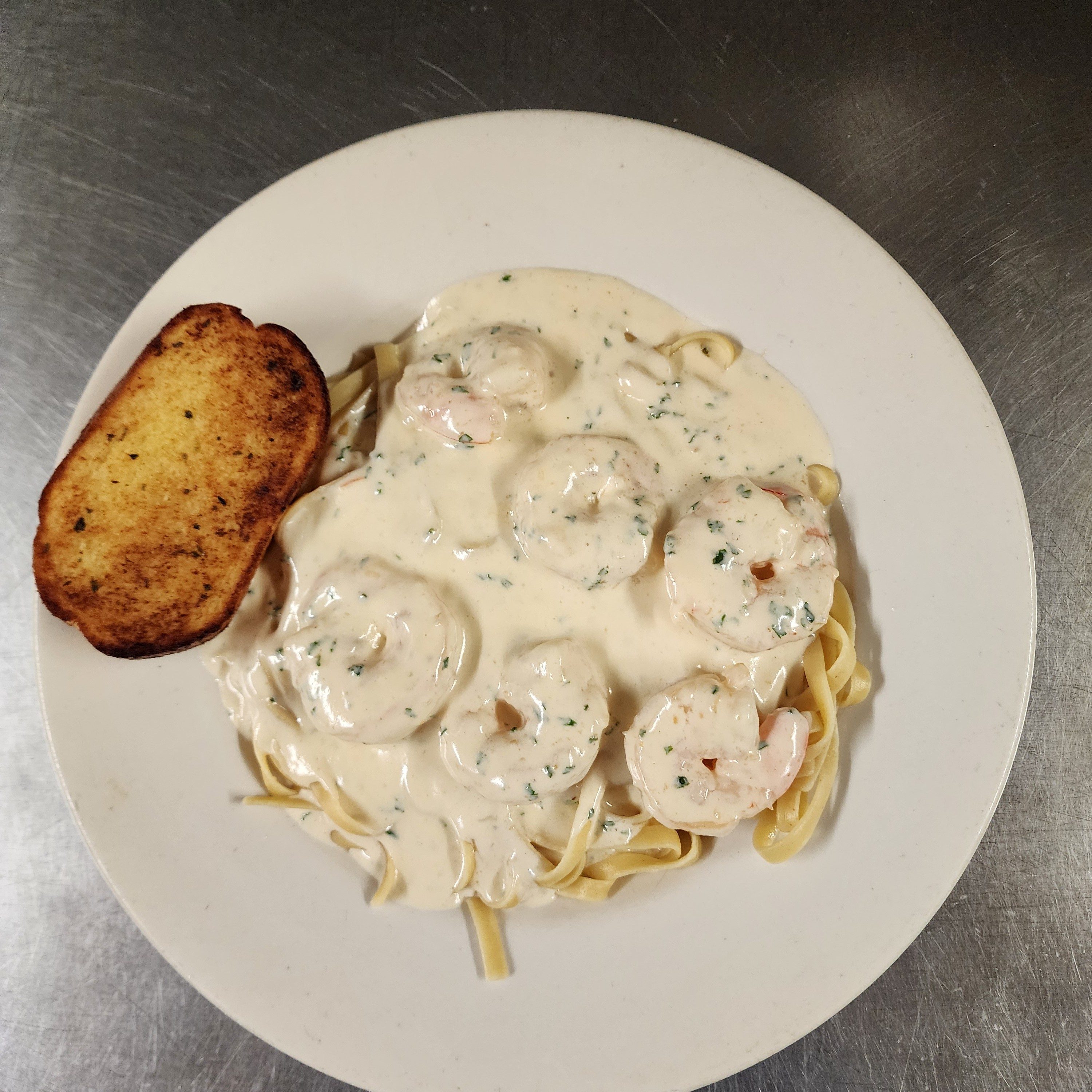 Shrimp Fettuccine Alfredo with Salad and Garlic Bread.