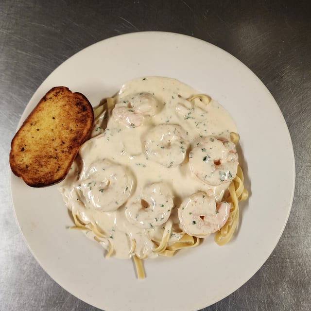Shrimp Fettuccine Alfredo with Salad and Garlic Bread.