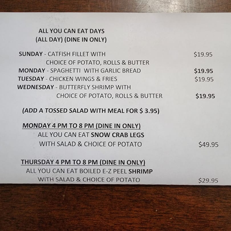A menu from The Hub German Restaurant & Lounge detailing daily all-you-can-eat specials and prices.